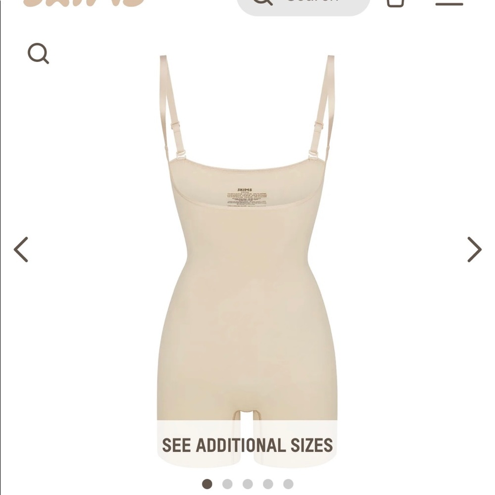 Brand new, never worn SKIMS open busy shortie body suit. Size XXS color sand.